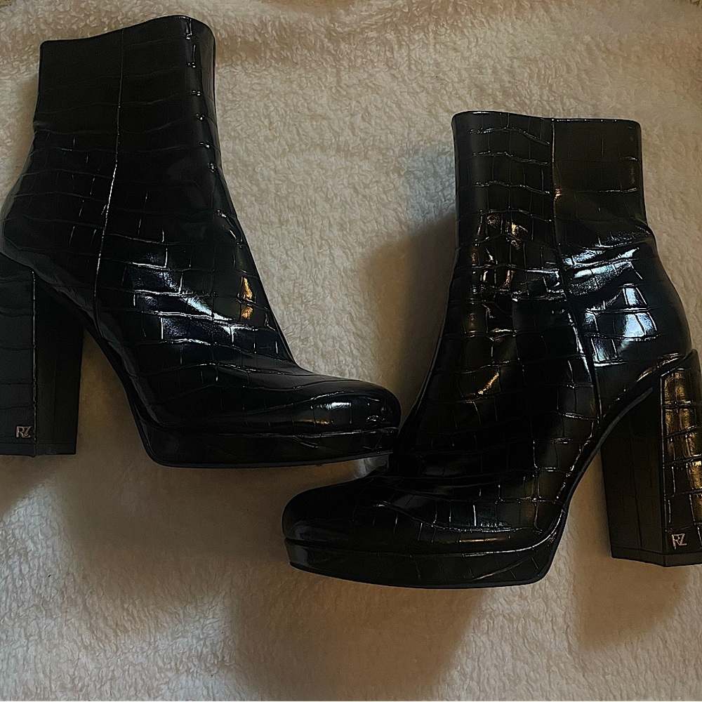 Black snake skin print booties. Worn few times